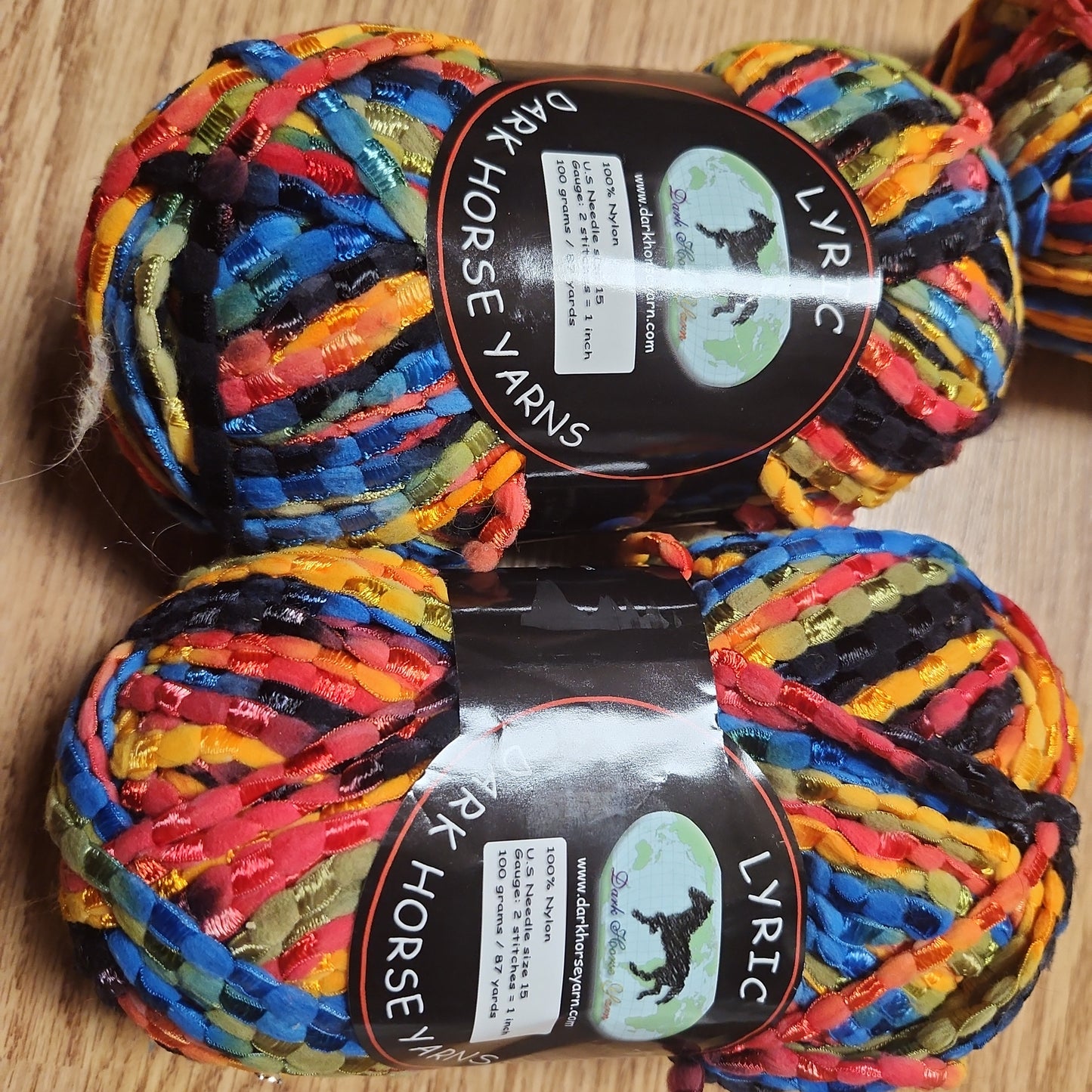 Dark Horse Yarns Lyric - black, blue, green, yellow, red