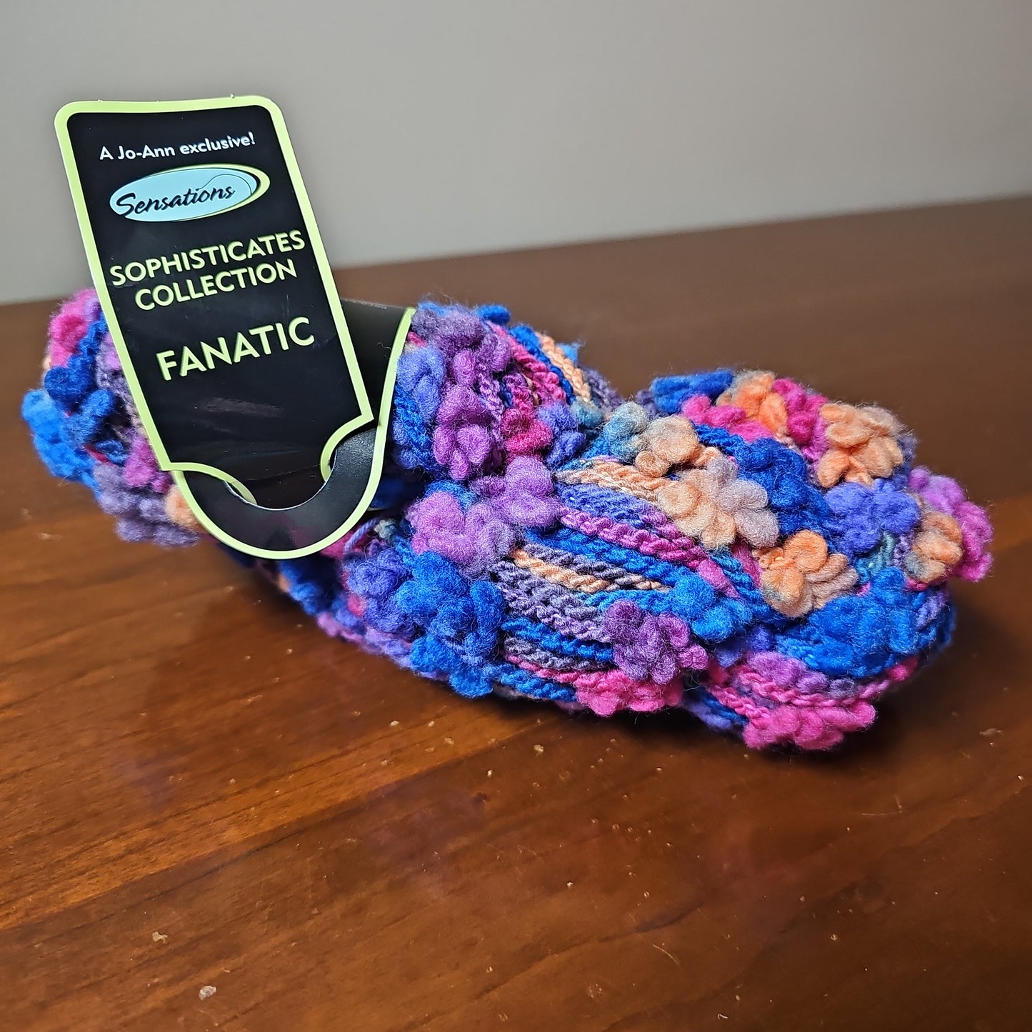 JoAnn Sophisticates Fanatic Blue, orange, Pink, and Purple Yarn