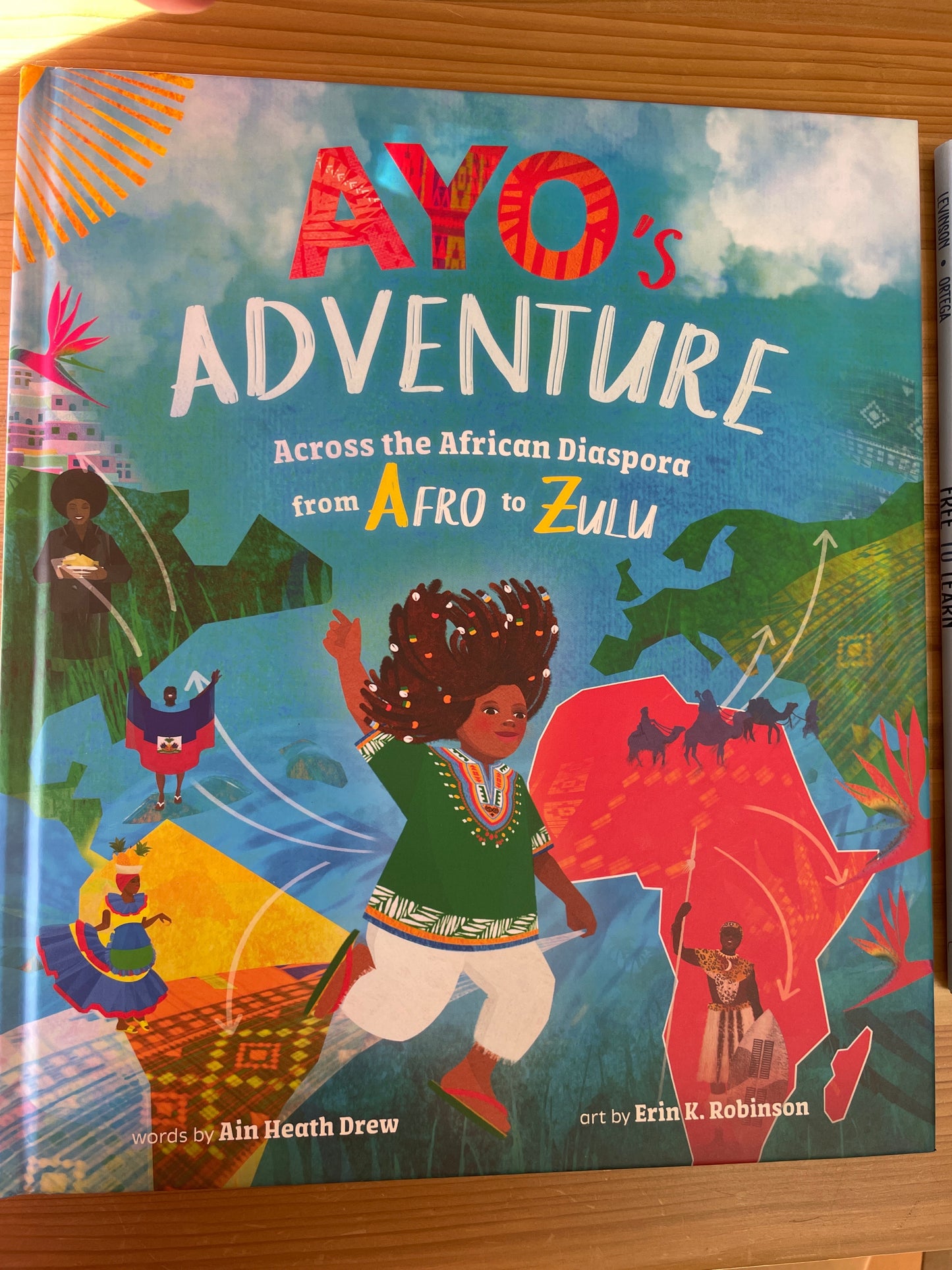 Ayo's Adventure Across the African Diaspora from Afro to Zulu, words by Ain Heath Drew and art by Erin K. Robinson